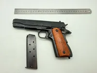 Colt m1911,  Denix metal kan tage ladegreb