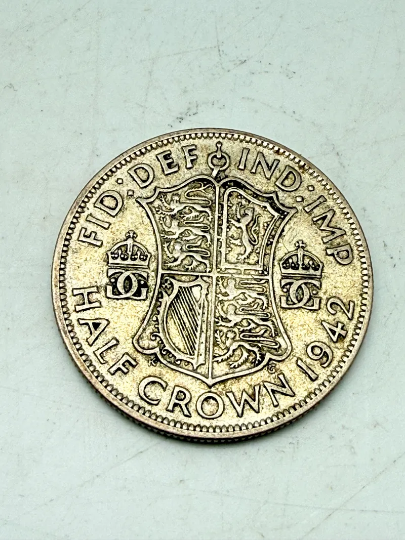 Engelsk half crown 1942 i sølv, 14 gram 0.500 lødighed