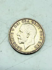 Engelsk shilling 1936 i sølv, 5,5 gram 0.500 lødighed