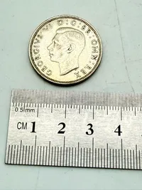 Engelsk 2 shilling 1944 i sølv, 11 gram 0.500 lødighed