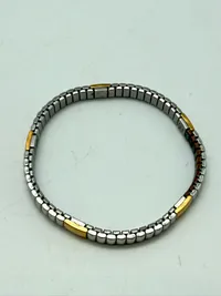 Stål armbånd med 18 karat guld indlæg