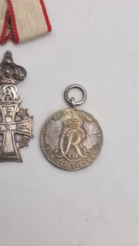 Miniture medaljer med mangler