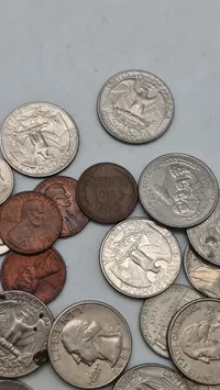 Assorted Lot of US Circulated Coins - Quarters, Dimes, Nickels, and Pennies