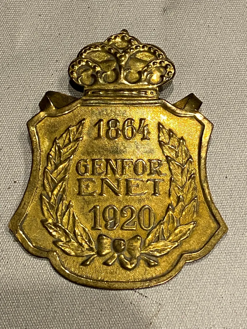 Originalt skilt med teksten 1864-1920 Genforenet