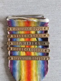 Original US ww1 medalje - godt fyldt med bars