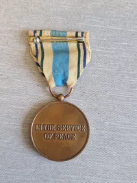 Lot UN + M/23 hjelmmærke
