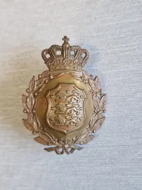 Lot UN + M/23 hjelmmærke