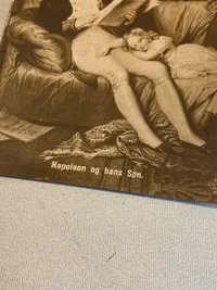 Postkort med motiv af Napoleon og søn - har desværre været klistret ind i bog