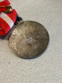 Samling medaljer mm. En af sølv