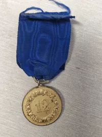 Original medalje for 12 års tro tjeneste