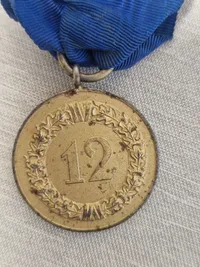 Original medalje for 12 års tro tjeneste