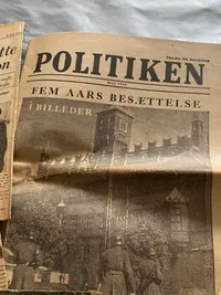 Lot originale aviser fra befrielses dagene - der ligger et enkelt genoptryk imellem