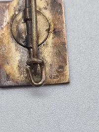 Originale Kong Chr X kongemærker designet af danske Georg Jensen