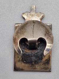 Originale Kong Chr X kongemærker designet af danske Georg Jensen