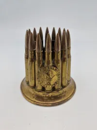 Erindring fra soldatertiden i form af krans lavet af patroner - navngivet, 1939
