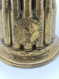 Erindring fra soldatertiden i form af krans lavet af patroner - navngivet, 1939