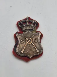 Ærme mærke for lærer ved Skyde skolen  ca. 1871