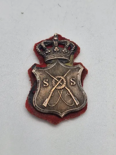 Ærme mærke for lærer ved Skyde skolen  ca. 1871