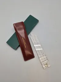 Regnestok med holder og æske