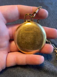Tissot lommeur med bagkasse af 18 karat guld (bagkasse vejer ca 3 gram)