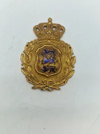 Originalt brystskjold fra den danske brigade i Sverige