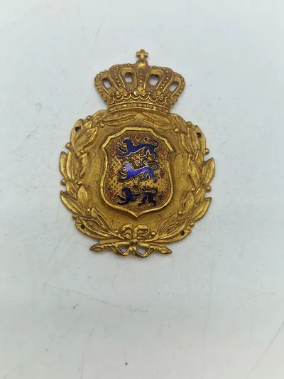 Originalt brystskjold fra den danske brigade i Sverige