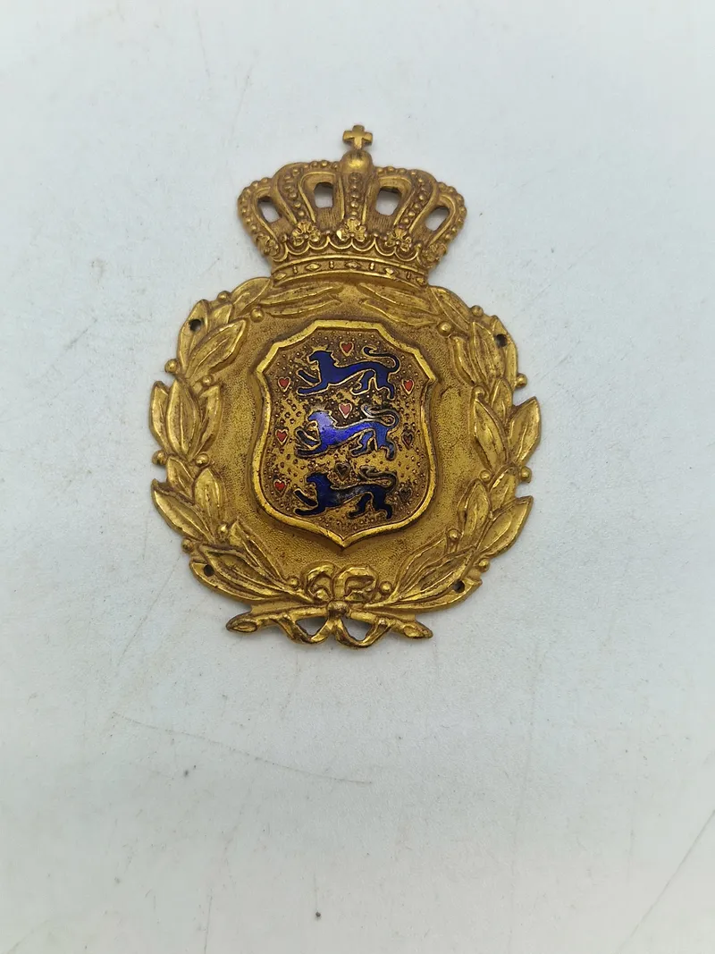 Originalt brystskjold fra den danske brigade i Sverige