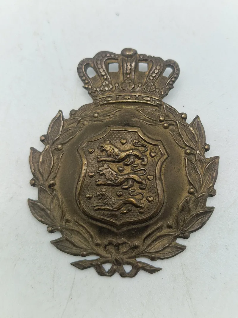Originalt M/23 hjelmmærke