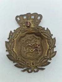 Originalt M/23 hjelmmærke