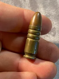 Sjælden tidlig dansk eksercerpatron for pistol 1910/21