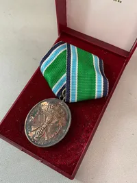 Original HJV medalje af sterlingsølv for 25 års tjeneste med tilhørende æske