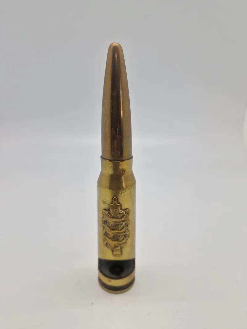 Oplukker i form af 20 mm patron