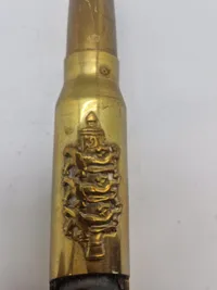Oplukker i form af 20 mm patron
