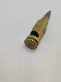 Oplukker i form af 20 mm patron