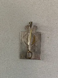 Originalt kongemærke designet af Georg Jensen