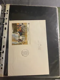 Stor mappe med førstedagskuverter