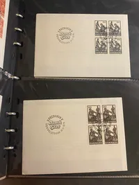 Stor mappe med førstedagskuverter