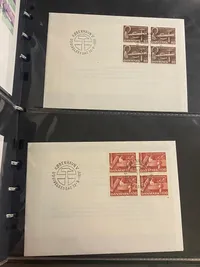 Stor mappe med førstedagskuverter