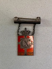 Originalt kongemærke designet af Georg Jensen