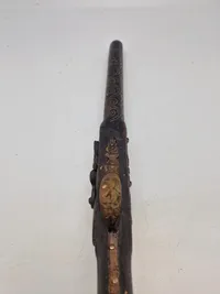 Deko pistol med økse i enden