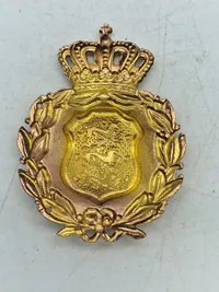 Originalt brystskjold fra den danske brigade i Sverige