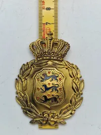 Originalt brystskjold fra den danske brigade i Sverige