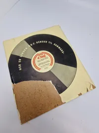Original lakplade med frihedsbudskabet
