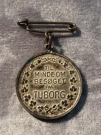 Original medalje til minde om besøget på Tuborg