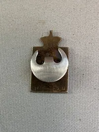 Originalt kongemærke designet af Georg Jensen