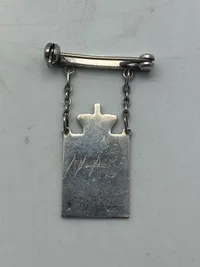 Originalt Georg Jensen kongemærke af sterlingsølv (kvindeudgaven og 1945 modellen)