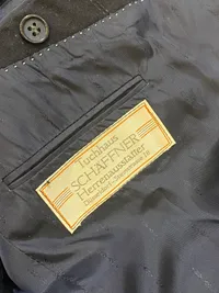 Dansk uniformsjakke og huebånd fra handelsflåden