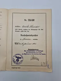 Originalt urkunde på reichsportsabceichen - ww2 (kvinde)