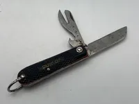 Original kniv med reklame for Dunlop