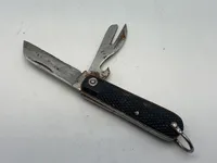 Original kniv med reklame for Dunlop